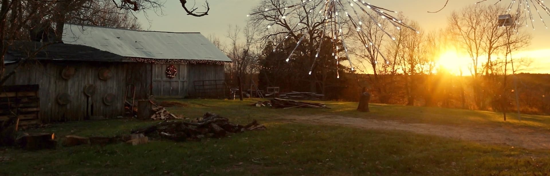 Barn at sunset with string lights