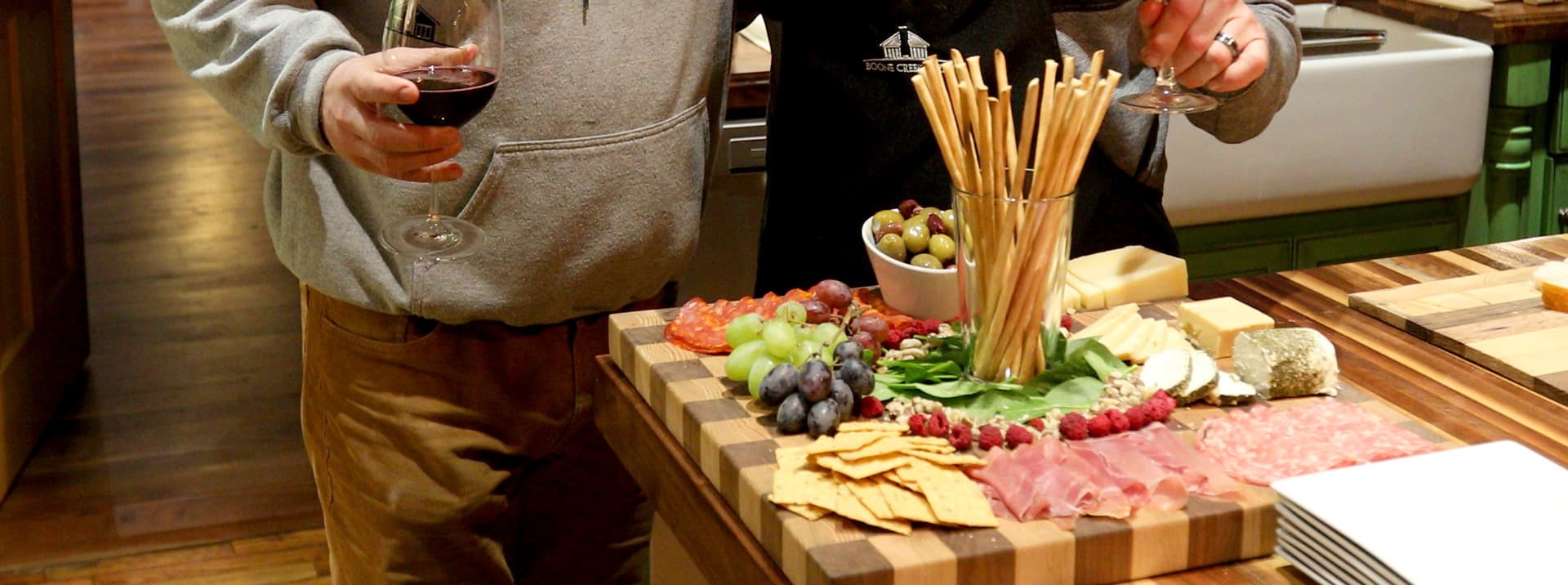 Charcuterie board and wine glasses in the kitchen